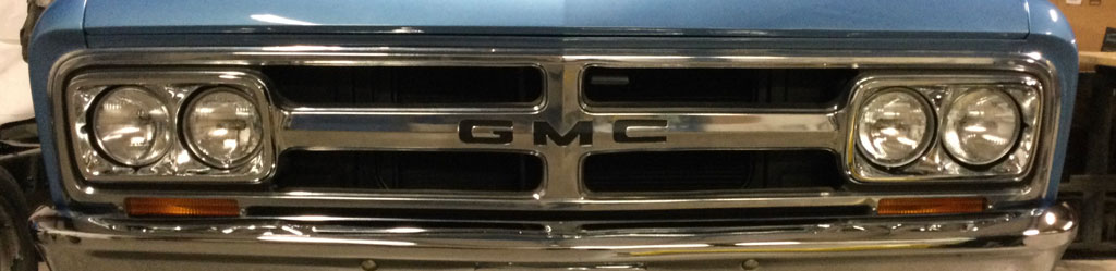 1967 GMC front grille with four headlights